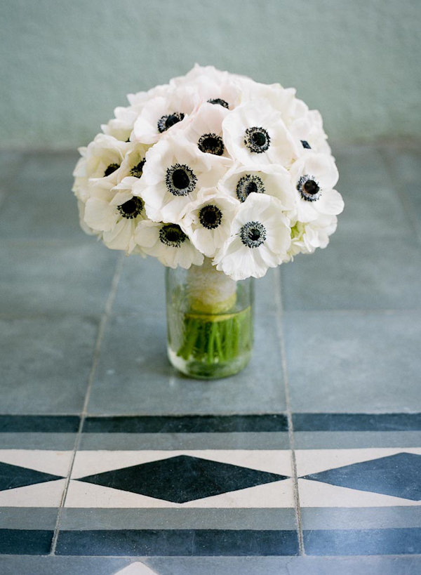 Stunning white flowers with black center bridal bouquet - wedding photo by top Austin based wedding photographers Q Weddings
